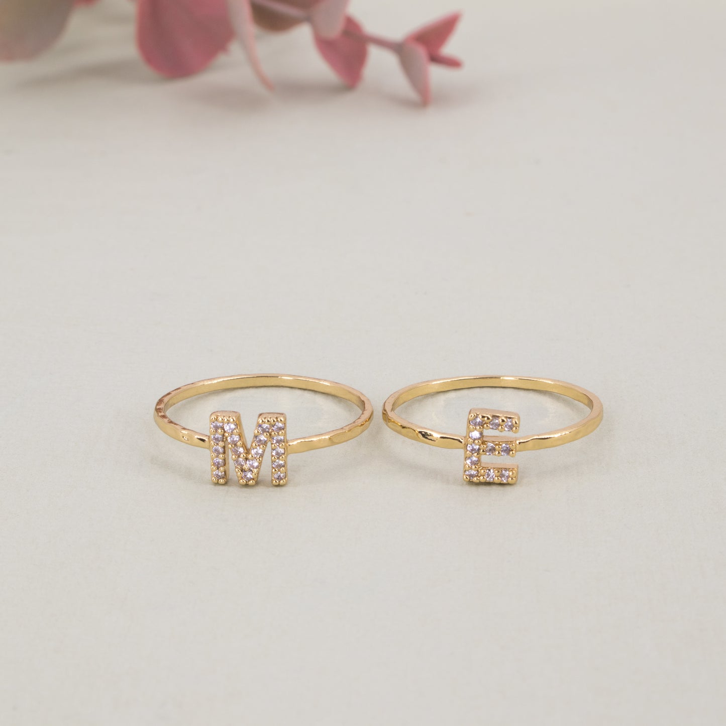 Pavé Crystal rings spelling the word "me"