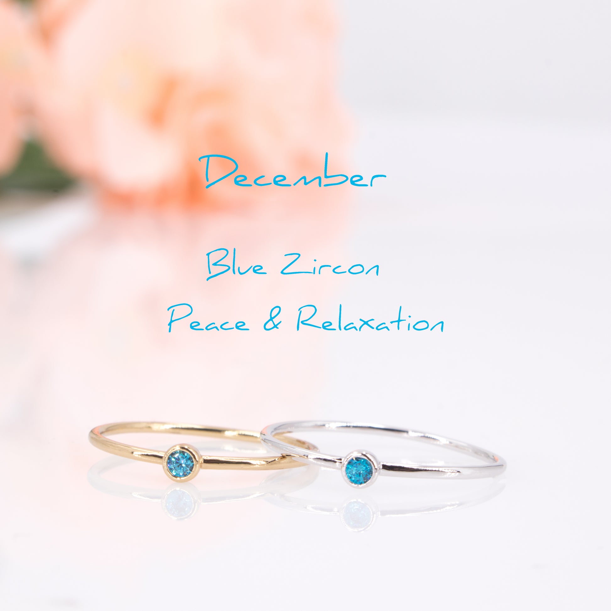 december silver and gold birthstone rings