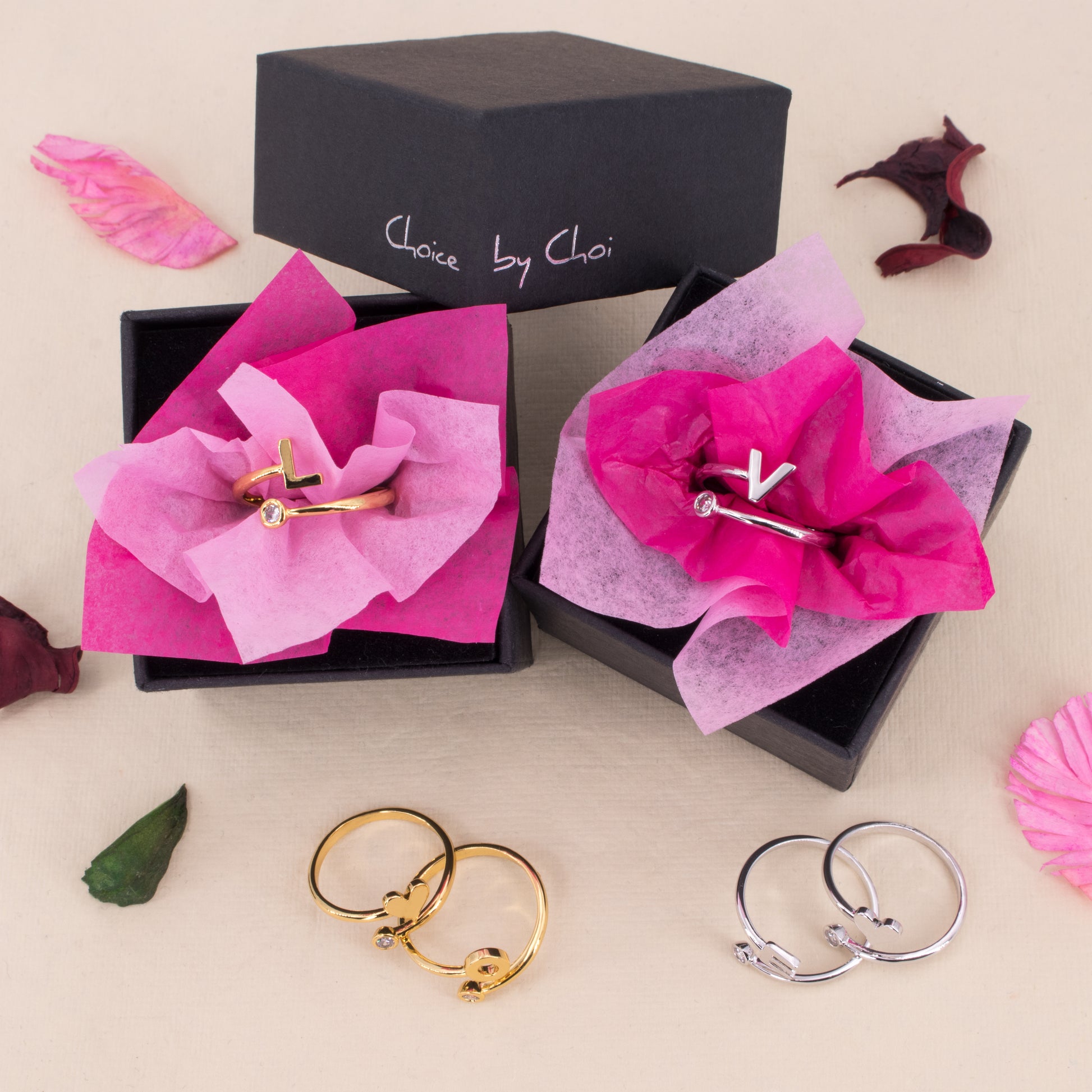 zirconia monogram cuff rings with boxes and flower petals